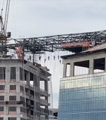 Horror vid shows builders clinging on for their lives 450ft up after one killed in high-rise construction site collapse | The Sun