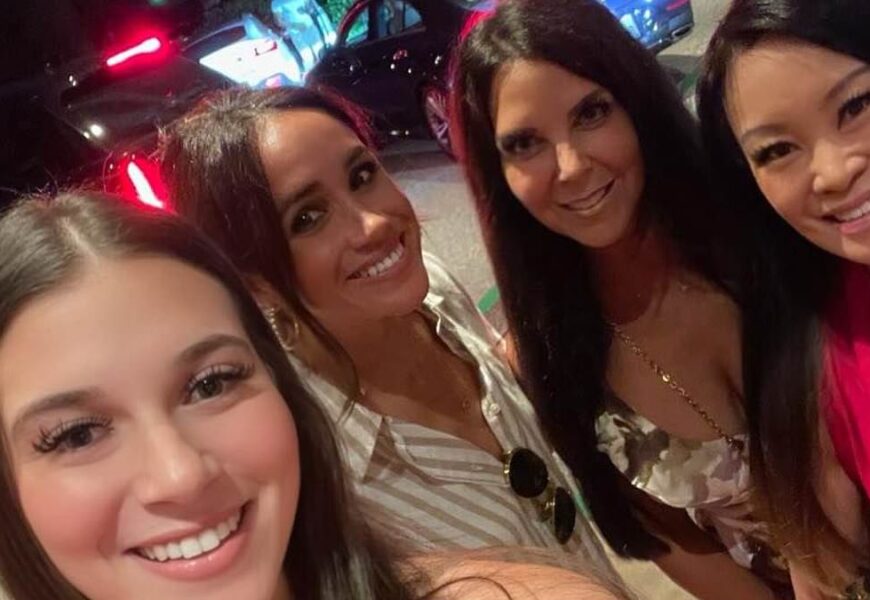 Meghan Markle poses for photo with TV host Jen Su and US socialite Meghan Markle poses for photo with TV host Jen Su and US socialite