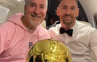 Eagle-eyed fans joke 'bro is everywhere' as they spot hidden star in pic of Lionel Messi posing with Ballon d’Or | The Sun